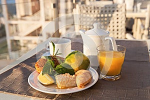 Breakfast on a table at open terrace