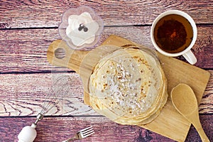 Breakfast with pancakes and tea