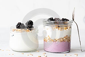 Breakfast parfait, overnight oats and greek yogurt in a jar photo