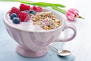 Breakfast with a pink tulip