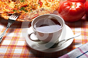 Breakfast pizza and tea