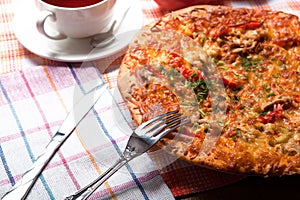 Breakfast pizza and tea