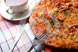 Breakfast pizza and tea