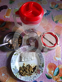 Breakfast  plater with bread and vegetables. Bread and watet