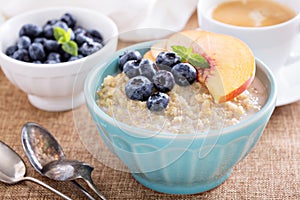 Breakfast quinoa porridge with fresh fruits