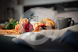 Breakfast with roses on bed at valentins day