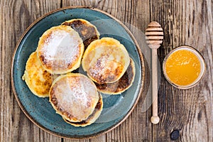 Breakfast. Russian traditional cottage cheese pancakes in the pl