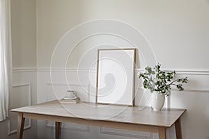 Breakfast, scandi interior still life. Minimal home design. White ceramic vase with blooming apple tree branches. Cup of