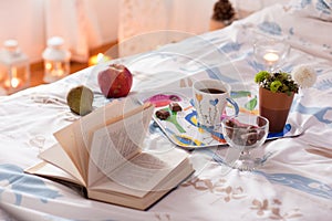 Breakfast served in bed with tea, chocolate and fruit