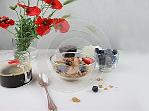 Breakfast served with coffee, cereals and fruits