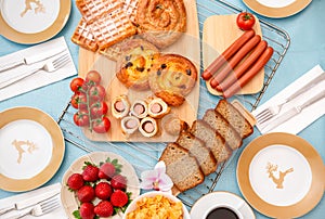 Breakfast Served in the morning with cereal bread, raisin bread, banana bread, sausage bread, chicken sausage, Natural corn flake