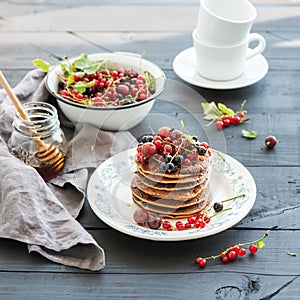 Breakfast set. Buckwheat pancakes with fresh