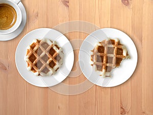 Breakfast set of waffles and coffee.