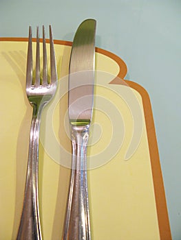 Breakfast setting bread napkin fork knife
