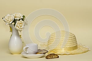 Breakfast setting with hat and flowers