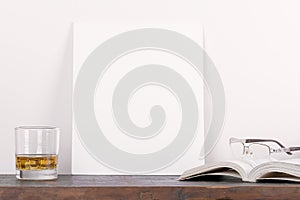 Breakfast still life., empty picture frame mockup on wooden desk, table. . Elegant working space, home office concept. Scandinavia