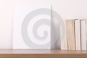 Breakfast still life., empty picture frame mockup on wooden desk, table. . Elegant working space, home office concept. Scandinavia