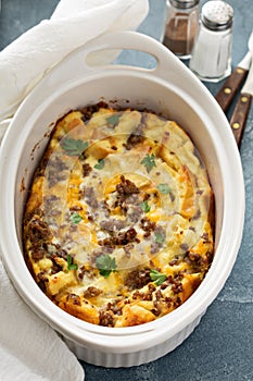 Breakfast strata with cheese and sausage