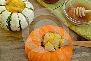 Breakfast stuffed mini-pumpkins with honey