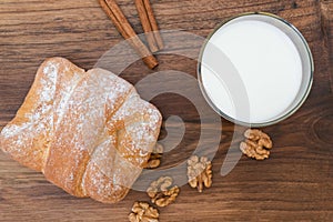 Breakfast - sweet walnut bun with glass of milk