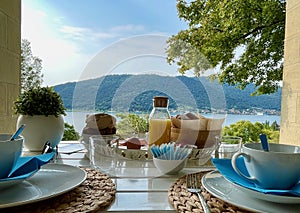 Breakfast table overlooking Lago d'Iseo, Sarnico, Italy. photo