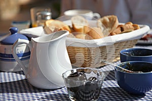 Breakfast table on sunny terrace, French Riviera