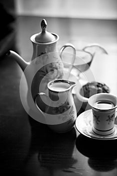 Breakfast with tea, black and white photo