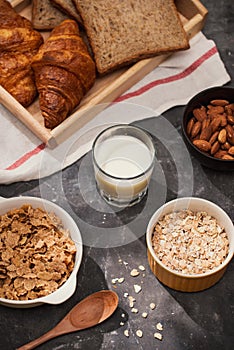 Breakfast with toast and croissant. milk in a glass bottle. Good start to the day. Good morning