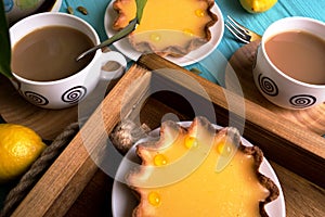 Lemon tarts and coffee