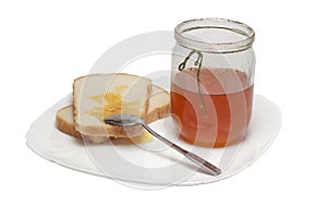 Breakfast with two toast and fresh honey