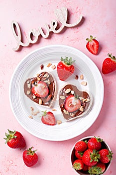 Breakfast for two, Valentines day food for couple in love with chocolate toasts and strawberry