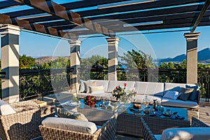 Breakfast on the veranda of a luxury home