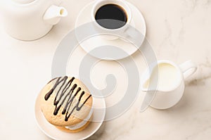 Breakfast whith Coffe and dessert/Breakfast whith Coffe and dessert on a white marble background. Top view