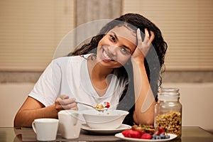 Breakfast, woman and portrait with yogurt in a home with fruit with muesli of cereal and strawberry. Health, nutrition