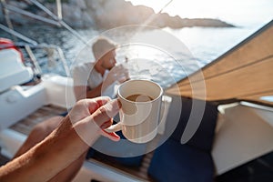 Breakfast on the yacht in bay on the sea