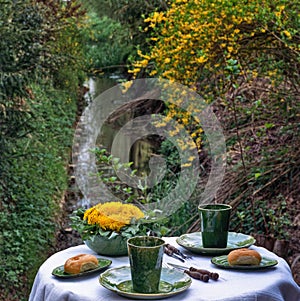 Breakfeast table dressed in rural scene