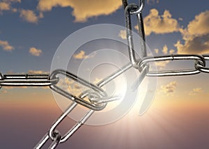 Breaking chain over sunrise background sky, breaking free, freedom, success or power concept