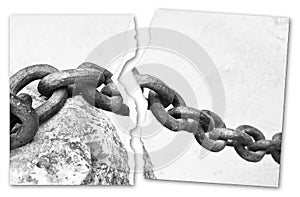 Breaking the chains - concept with a ripped photo of an old rusty break metal chain