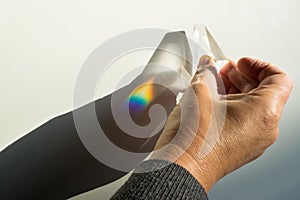 Breaking and dispersion of light in a prism, beautiful rainbow colors.