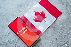 Breaking news, Canada country`s flag and the inscription news