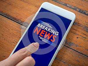 Breaking news online on smartphone