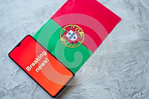 Breaking news, Portugal country`s flag and the inscription news