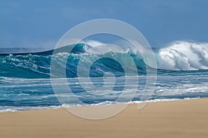 Breaking Ocean waves on a Hawaiian sandy beach