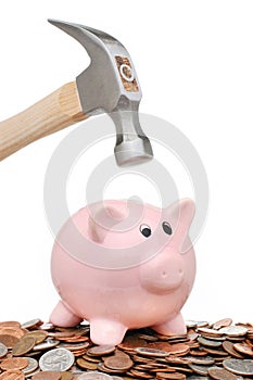Breaking a Piggy bank with a hammer