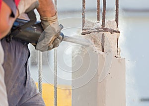 Breaking reinforced concrete with jackhammer