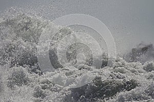 Breaking sea wave closeup