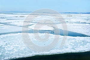 Breaking spring ice floe