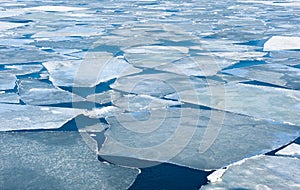 Breaking spring ice floe of japanese sea