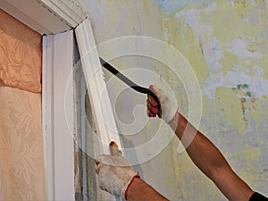 breaking the top of a door frame with a nail puller