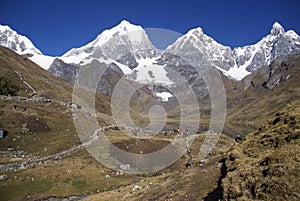 Breaking up high camp and packing mules